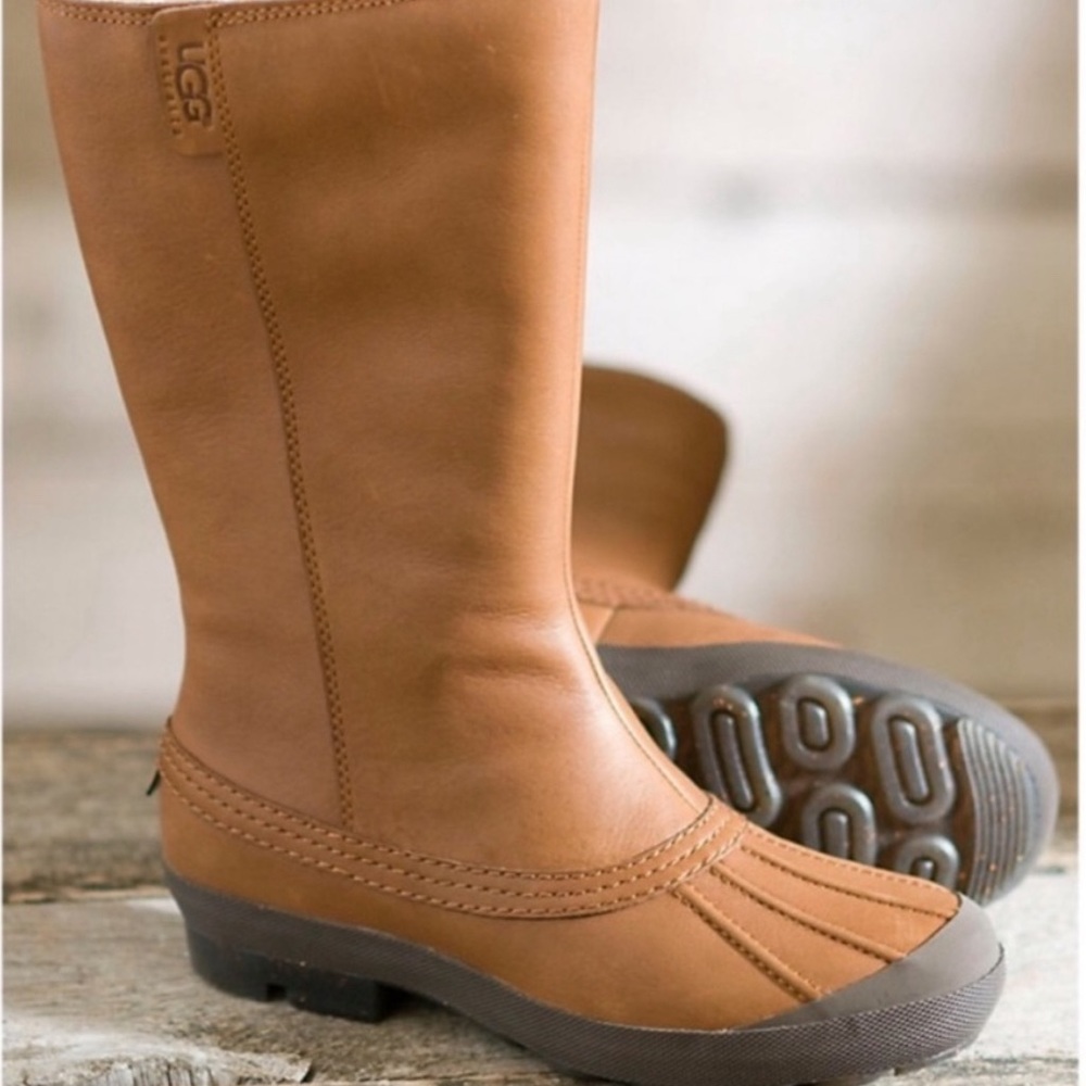 Uggs Brown Leather Boots with “Duck boot” bottoms and shearling wool lined